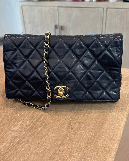 Sold!! Chanel black quilted calfskin flap turnlock bag