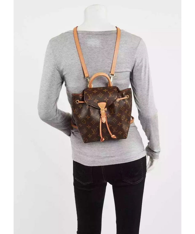 Sold!! authentic Louis Vuitton monogram montsouris BB backpack