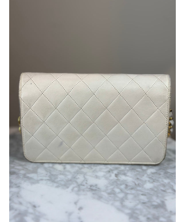 Sold!! Chanel cream quilted calfskin leather flap turn lock WOC crossbody bag