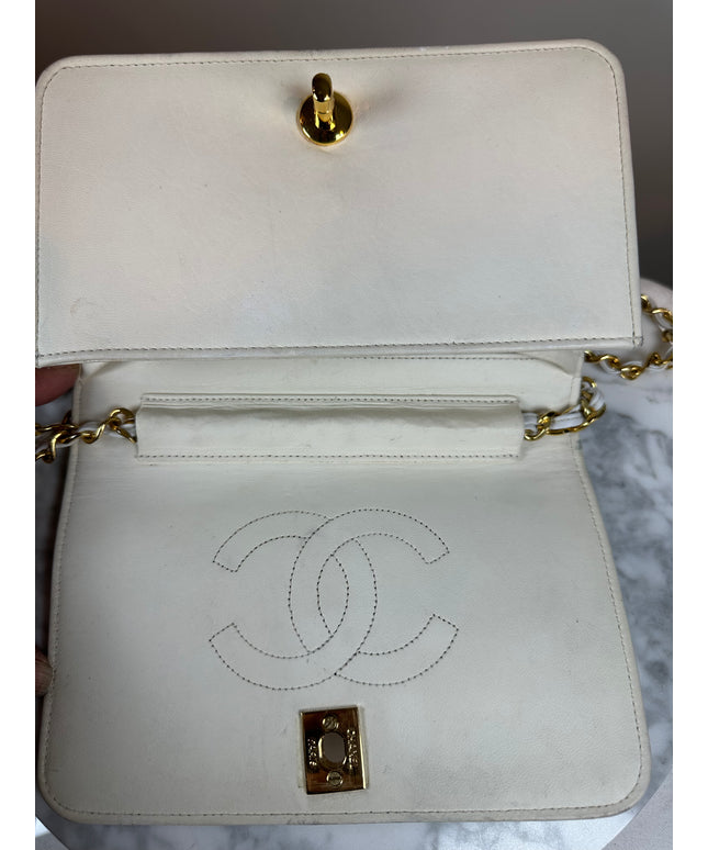 Sold!! Chanel cream quilted calfskin leather flap turn lock WOC crossbody bag