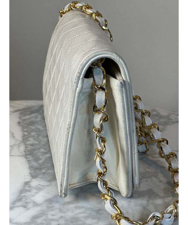 Sold!! Chanel cream quilted calfskin leather flap turn lock WOC crossbody bag