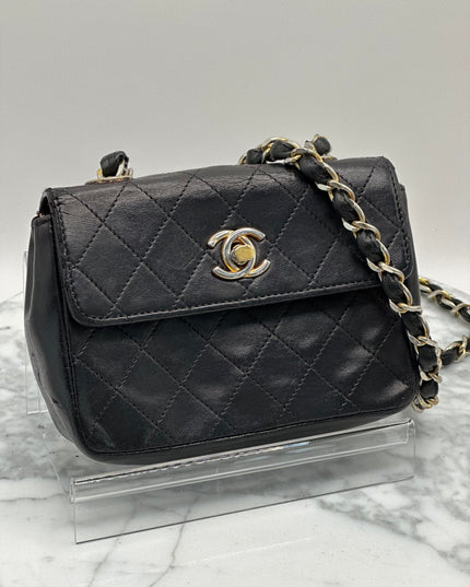 Sold!! Chanel black lambskin leather pouch crossbody bag with turnlock