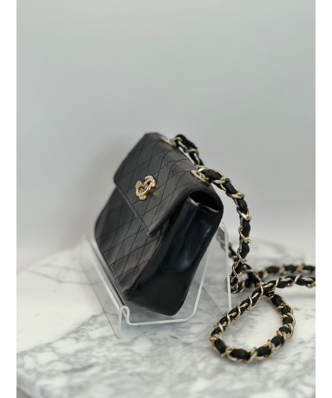 Sold!! Chanel black lambskin leather pouch crossbody bag with turnlock