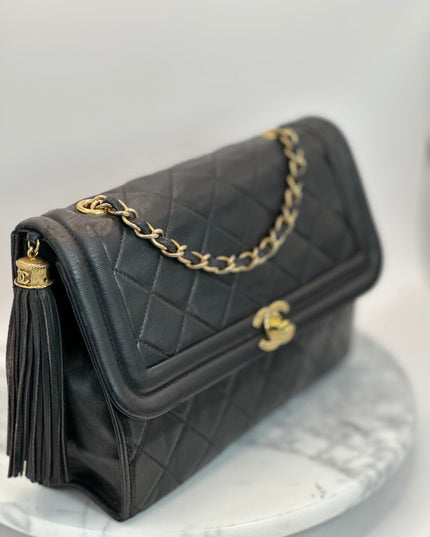 SOLD!! Chanel black quilted calfskin flap turnlock bag