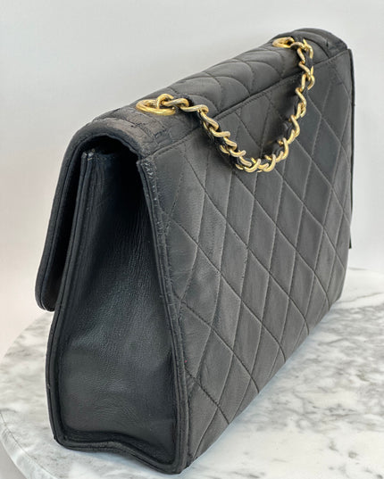 SOLD!! Chanel black quilted calfskin flap turnlock bag