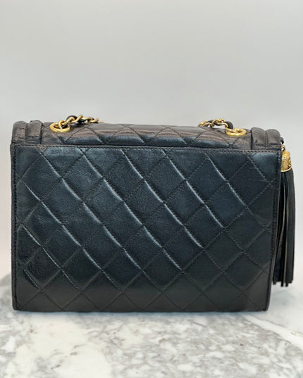 SOLD!! Chanel black quilted calfskin flap turnlock bag