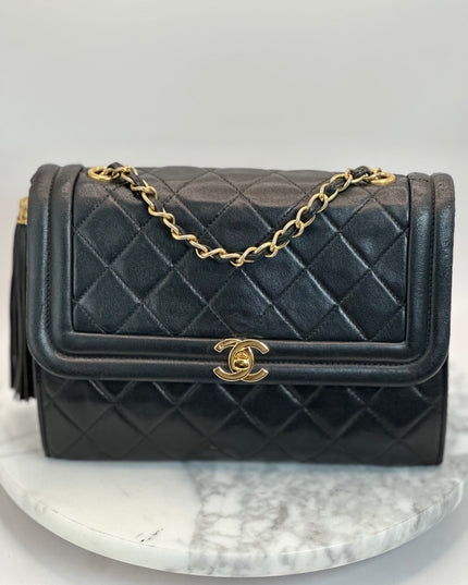 SOLD!! Chanel black quilted calfskin flap turnlock bag