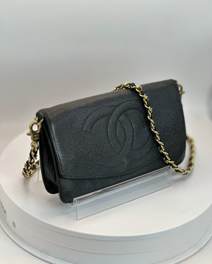 Chanel black caviar leather flap crossbody bag