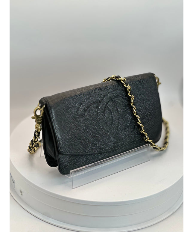 Chanel black caviar leather flap crossbody bag