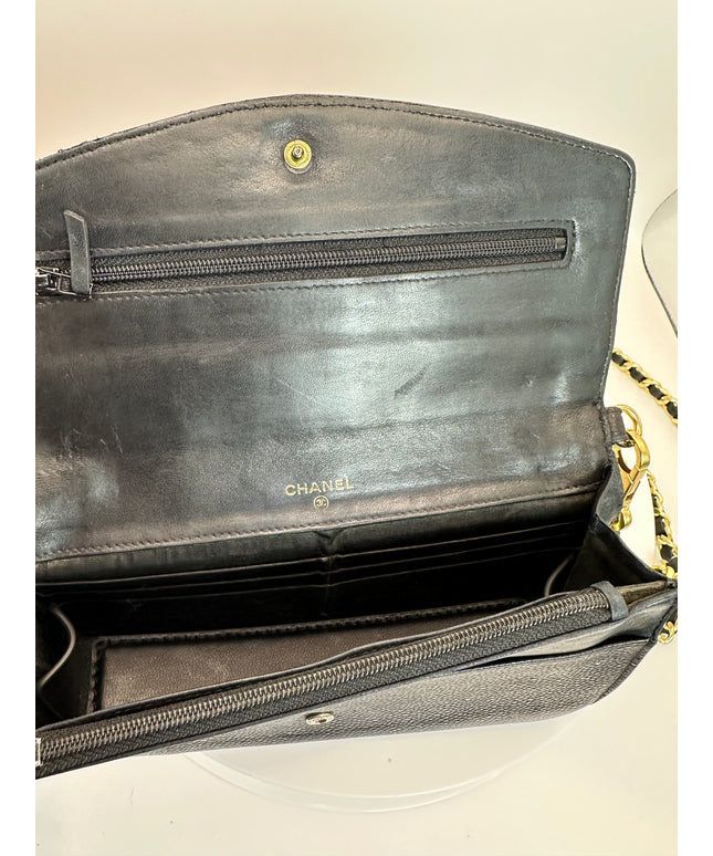 Chanel black caviar leather flap crossbody bag