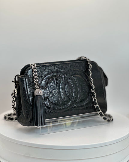 Chanel black caviar pouch with tassel and removable silver crossbody strap