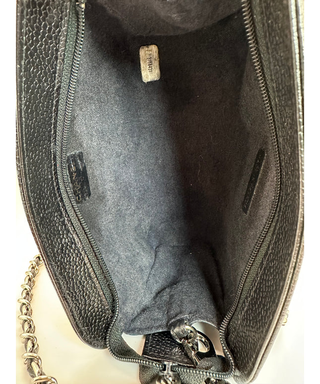Chanel black caviar pouch with tassel and removable silver crossbody strap