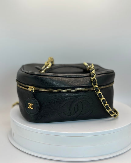 Authentic vintage Chanel black caviar top-handle vanity