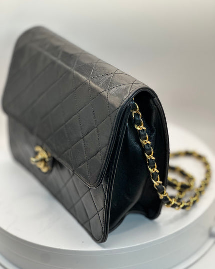 Chanel quilted black leather Flap crossbody with 24K turn lock and Chain