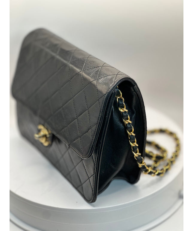 Sold!!  Chanel quilted black leather Flap crossbody with 24K turn lock and Chain
