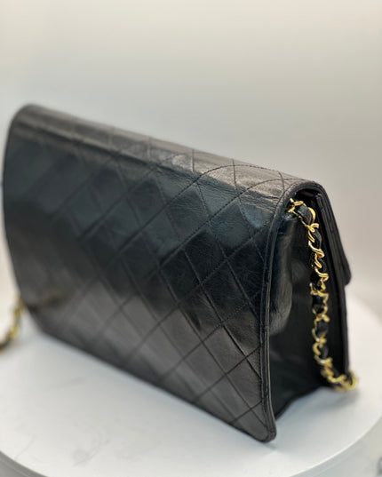 Chanel quilted black leather Flap crossbody with 24K turn lock and Chain