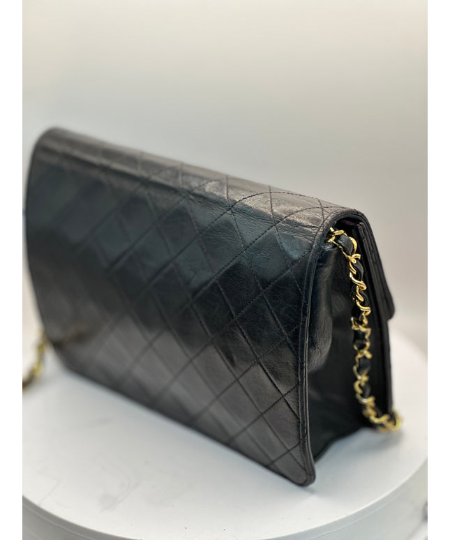 Sold!!  Chanel quilted black leather Flap crossbody with 24K turn lock and Chain