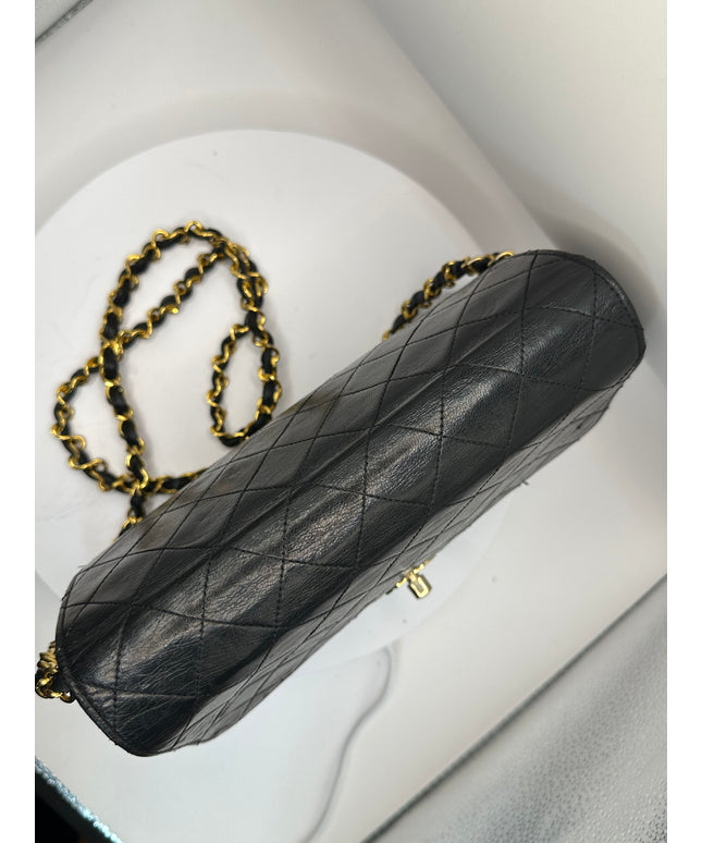 Sold!!  Chanel quilted black leather Flap crossbody with 24K turn lock and Chain