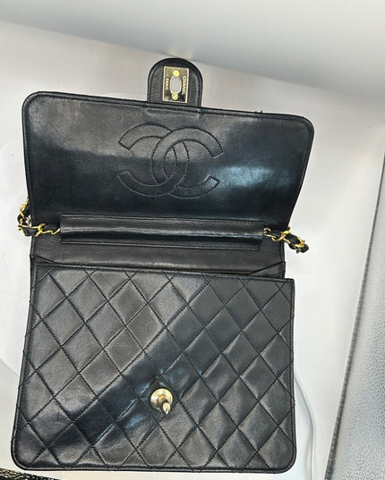 Chanel quilted black leather Flap crossbody with 24K turn lock and Chain