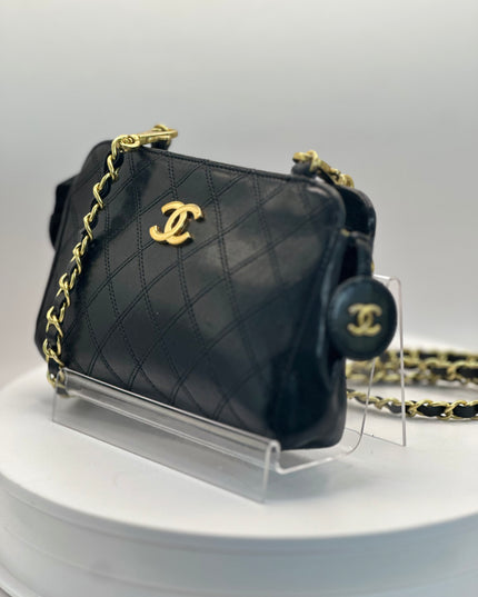 Chanel black quilted pouch crossbody bag