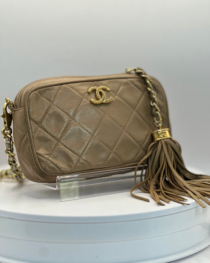 Chanel Beige quilted tassel camera crossbody bag