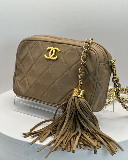 Chanel Beige quilted tassel camera crossbody bag