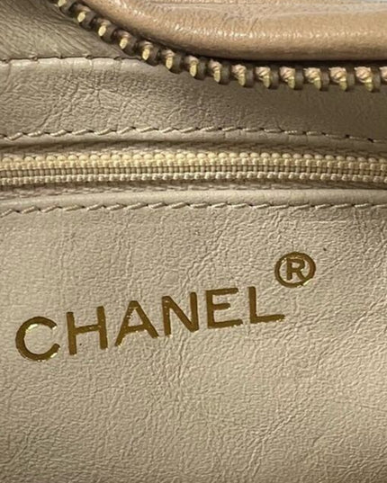 Chanel Beige quilted tassel camera crossbody bag