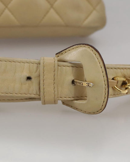 Chanel tan quilted belt turn lock bag with crossbody strap