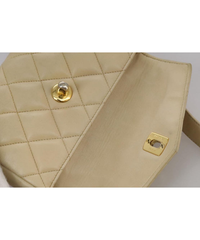 Chanel tan quilted belt turn lock bag with crossbody strap