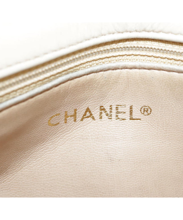 Chanel tan quilted belt turn lock bag with crossbody strap