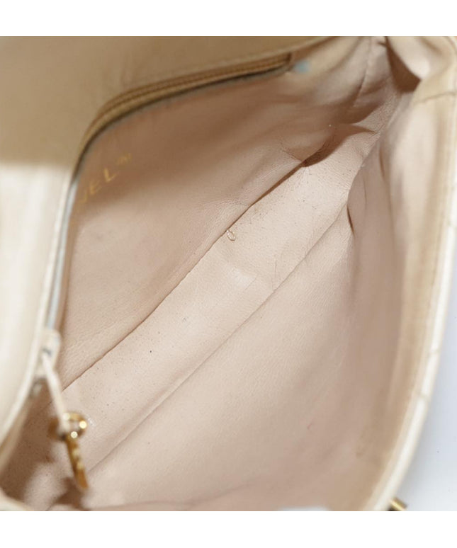 Chanel tan quilted belt turn lock bag with crossbody strap