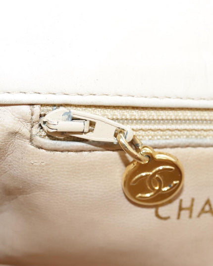 Chanel tan quilted belt turn lock bag with crossbody strap