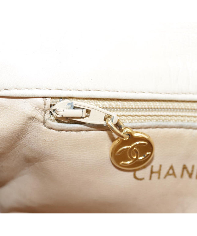 Chanel tan quilted belt turn lock bag with crossbody strap
