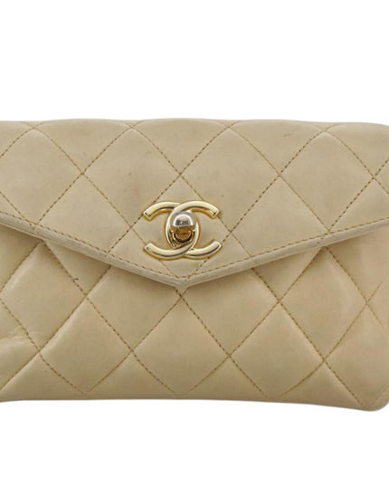 Chanel tan quilted belt turn lock bag with crossbody strap