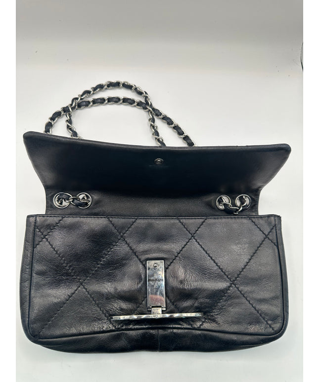 SOLD!! Chanel black calfskin quilted bag with large silver CC closure