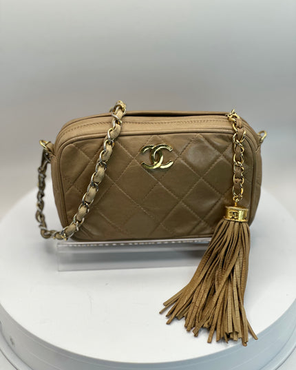 Sold!!  Chanel Beige quilted tassel camera crossbody bag
