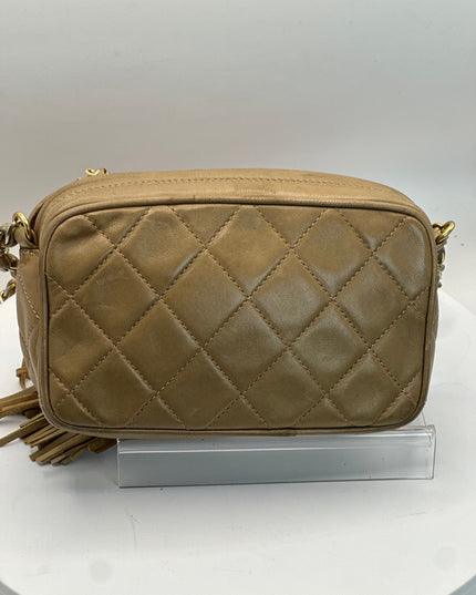 Sold!!  Chanel Beige quilted tassel camera crossbody bag