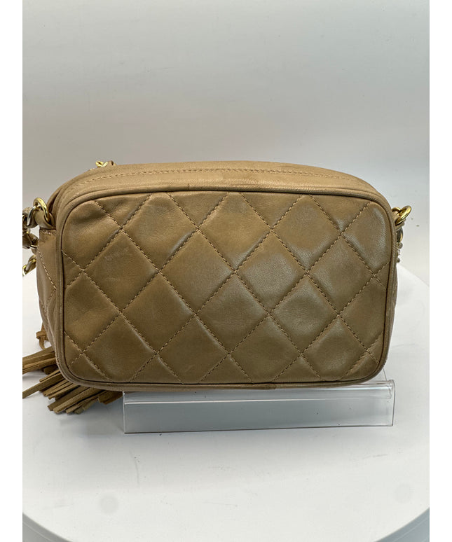 Sold!!  Chanel Beige quilted tassel camera crossbody bag