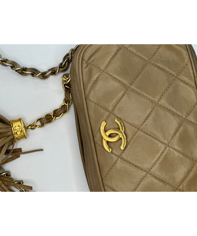 Sold!!  Chanel Beige quilted tassel camera crossbody bag