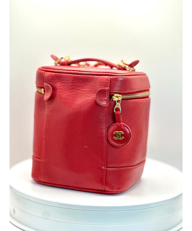 Authenticated Chanel red caviar vanity bag