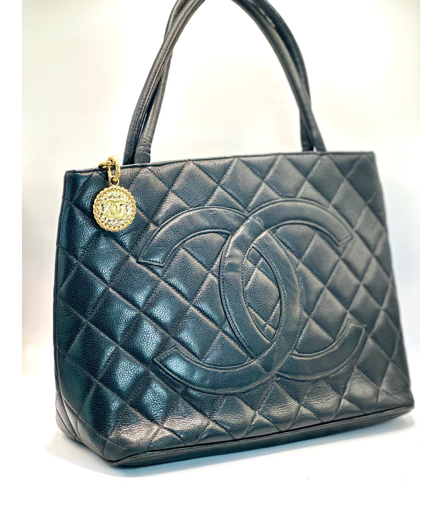 Chanel black caviar leather medallion tote