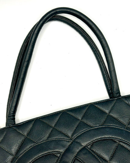 Chanel black caviar leather medallion tote