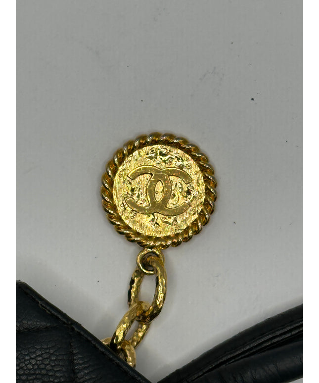 Chanel black caviar leather medallion tote