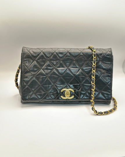 Chanel black quilted calfskin flap turnlock bag