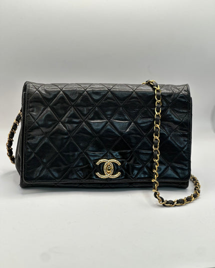 Chanel black quilted calfskin flap turnlock bag