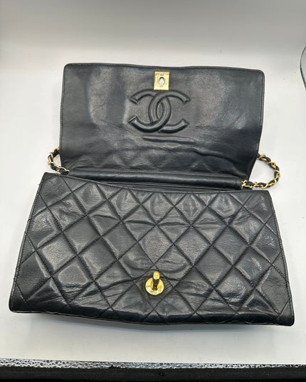 Chanel black quilted calfskin flap turnlock bag