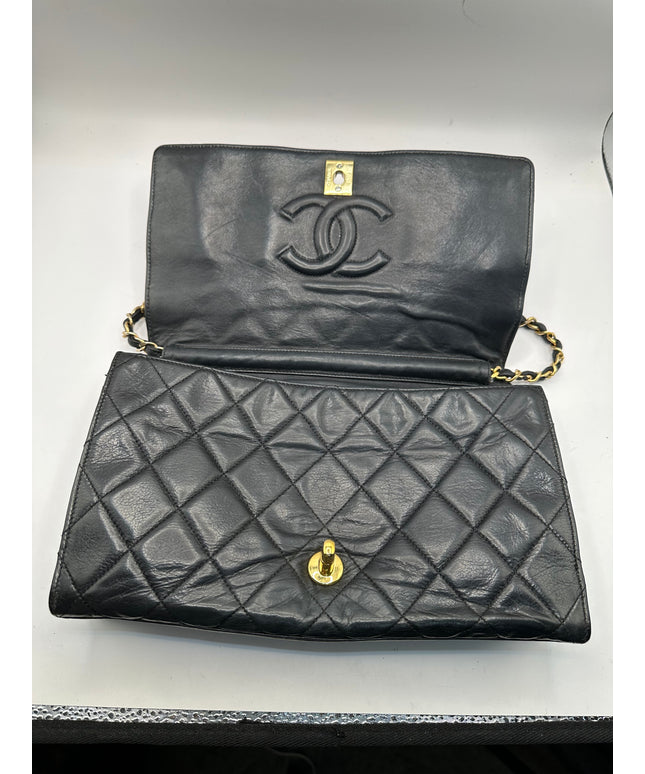Chanel black quilted calfskin flap turnlock bag