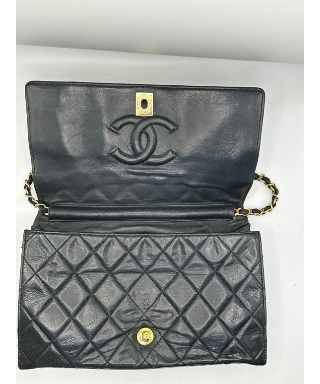 Chanel black quilted calfskin flap turnlock bag