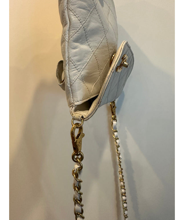Authentic Chanel white calfskin turn lock belt bag with crossbody chain