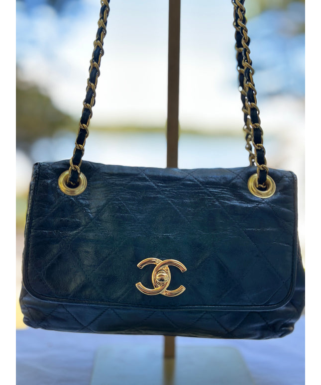 Chanel black leather flap chain bag